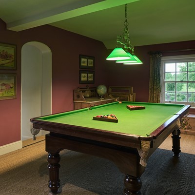 Lot 49 - A two-thirds-size mahogany-framed slate billiard table