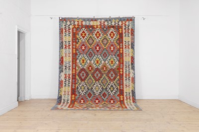 Lot 241 - A flat-weave wool kilim carpet