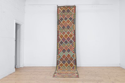 Lot 653 - A flat-weave wool kilim runner