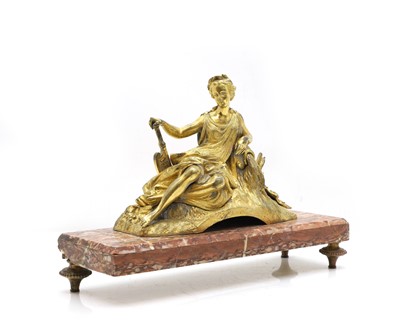 Lot 294 - A gilt-metal figure