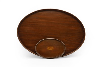 Lot 437 - ​Two mahogany oval trays