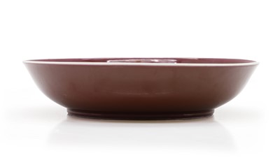 Lot 116 - A Chinese sang-de-boeuf glazed dish