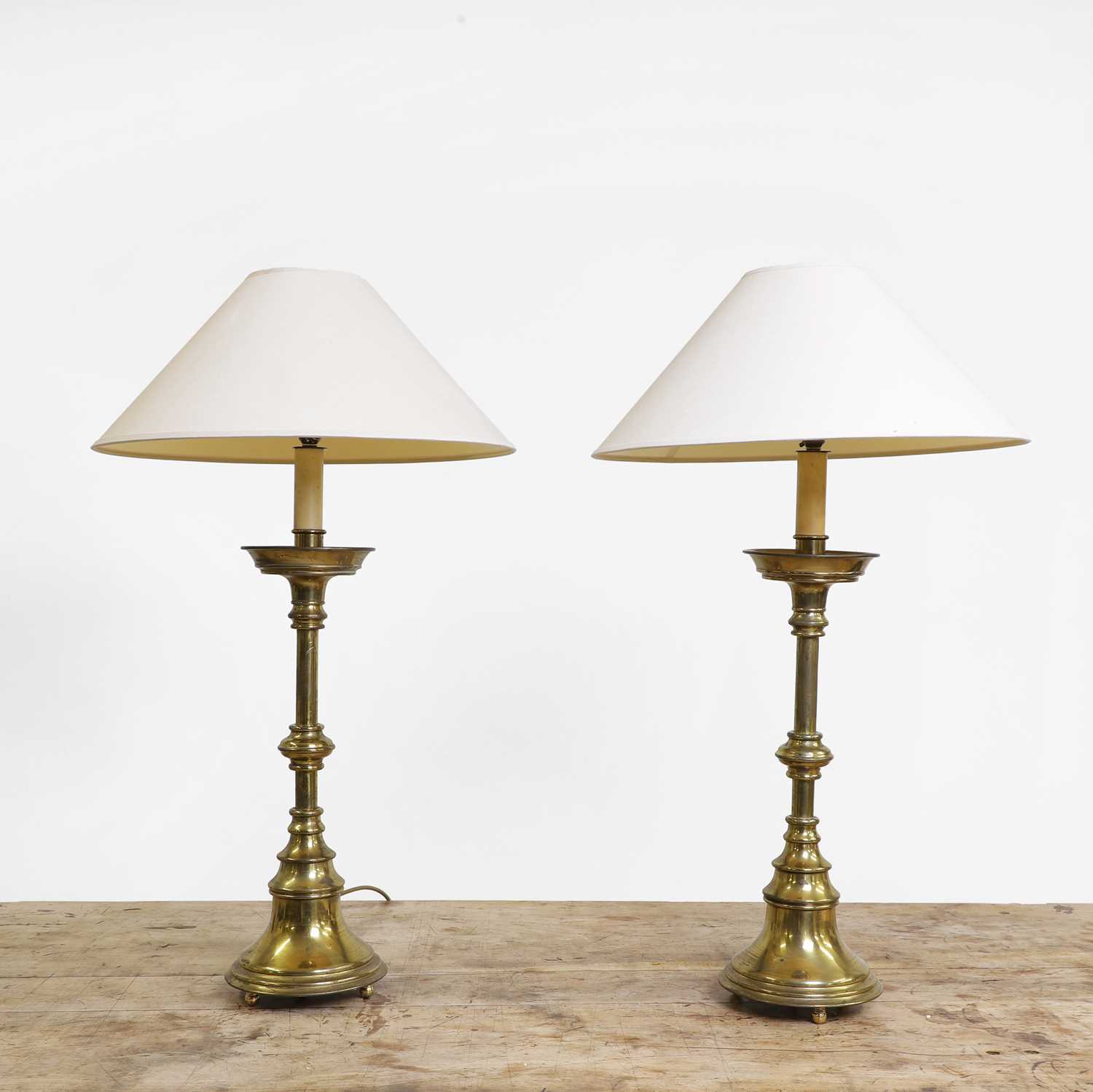 Lot 211 - A pair of Victorian brass altar table lamps