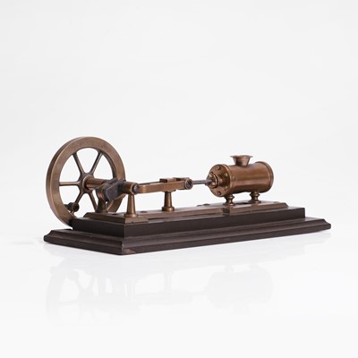 Lot 112 - A novelty brass mechanical cigar cutter