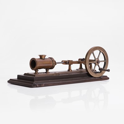 Lot 112 - A novelty brass mechanical cigar cutter