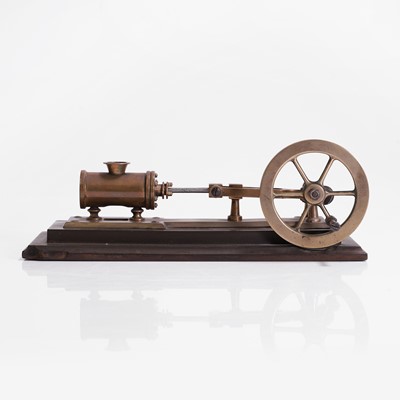 Lot 112 - A novelty brass mechanical cigar cutter