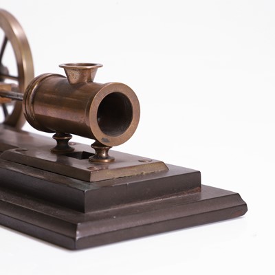 Lot 112 - A novelty brass mechanical cigar cutter