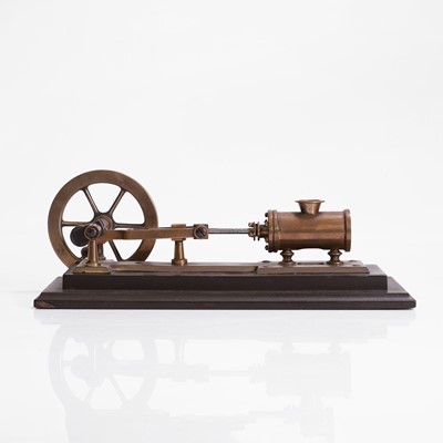 Lot 112 - A novelty brass mechanical cigar cutter