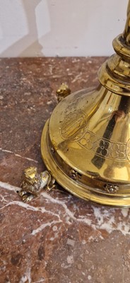 Lot 87 - A pair of large Gothic-style brass candelabra