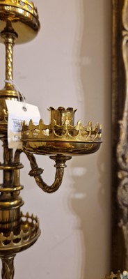 Lot 87 - A pair of large Gothic-style brass candelabra