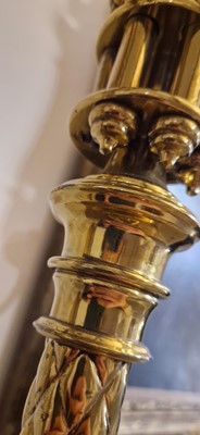 Lot 87 - A pair of large Gothic-style brass candelabra