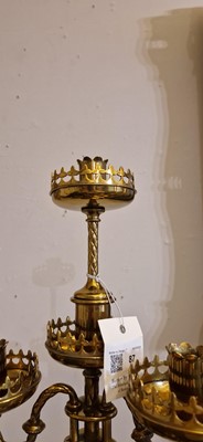 Lot 87 - A pair of large Gothic-style brass candelabra