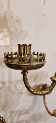 Lot 87 - A pair of large Gothic-style brass candelabra