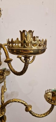 Lot 87 - A pair of large Gothic-style brass candelabra