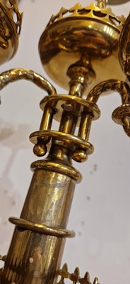 Lot 87 - A pair of large Gothic-style brass candelabra