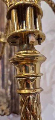 Lot 87 - A pair of large Gothic-style brass candelabra