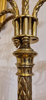 Lot 87 - A pair of large Gothic-style brass candelabra