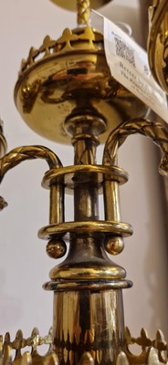 Lot 87 - A pair of large Gothic-style brass candelabra