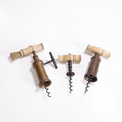 Lot 110 - A collection of three corkscrews