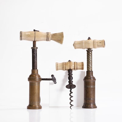 Lot 110 - A collection of three corkscrews