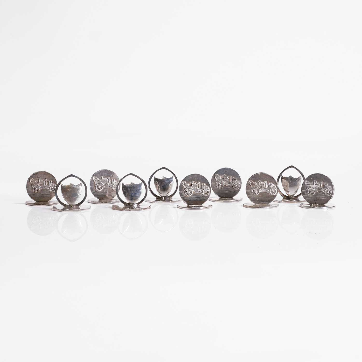 Lot 98 - A collection of six silver menu stands