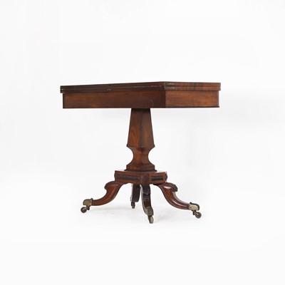 Lot 124 - A Regency strung mahogany fold-over card table