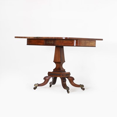 Lot 124 - A Regency strung mahogany fold-over card table