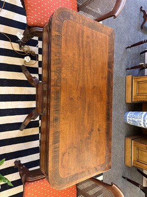 Lot 124 - A Regency strung mahogany fold-over card table