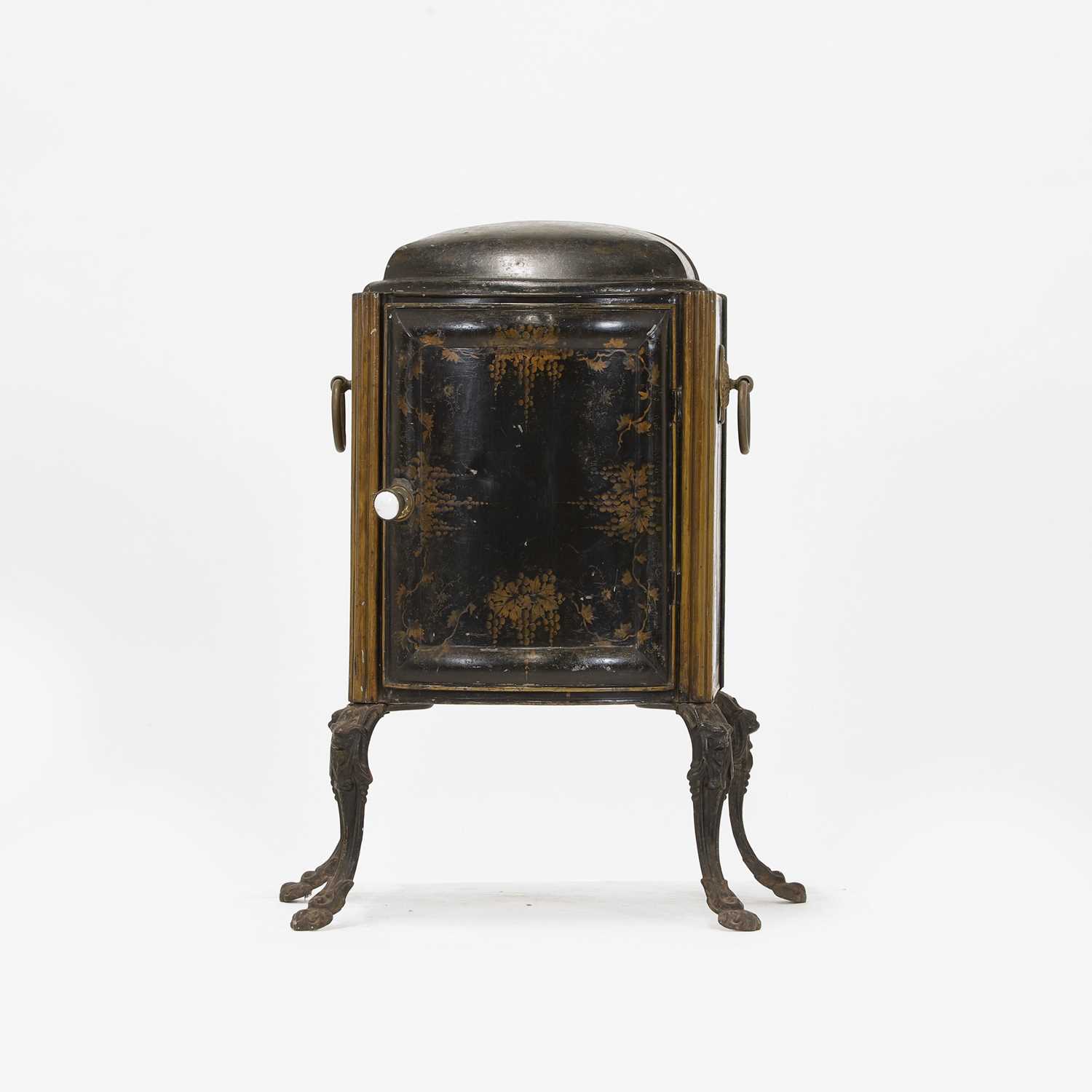 Lot 129 - A toleware plate warmer