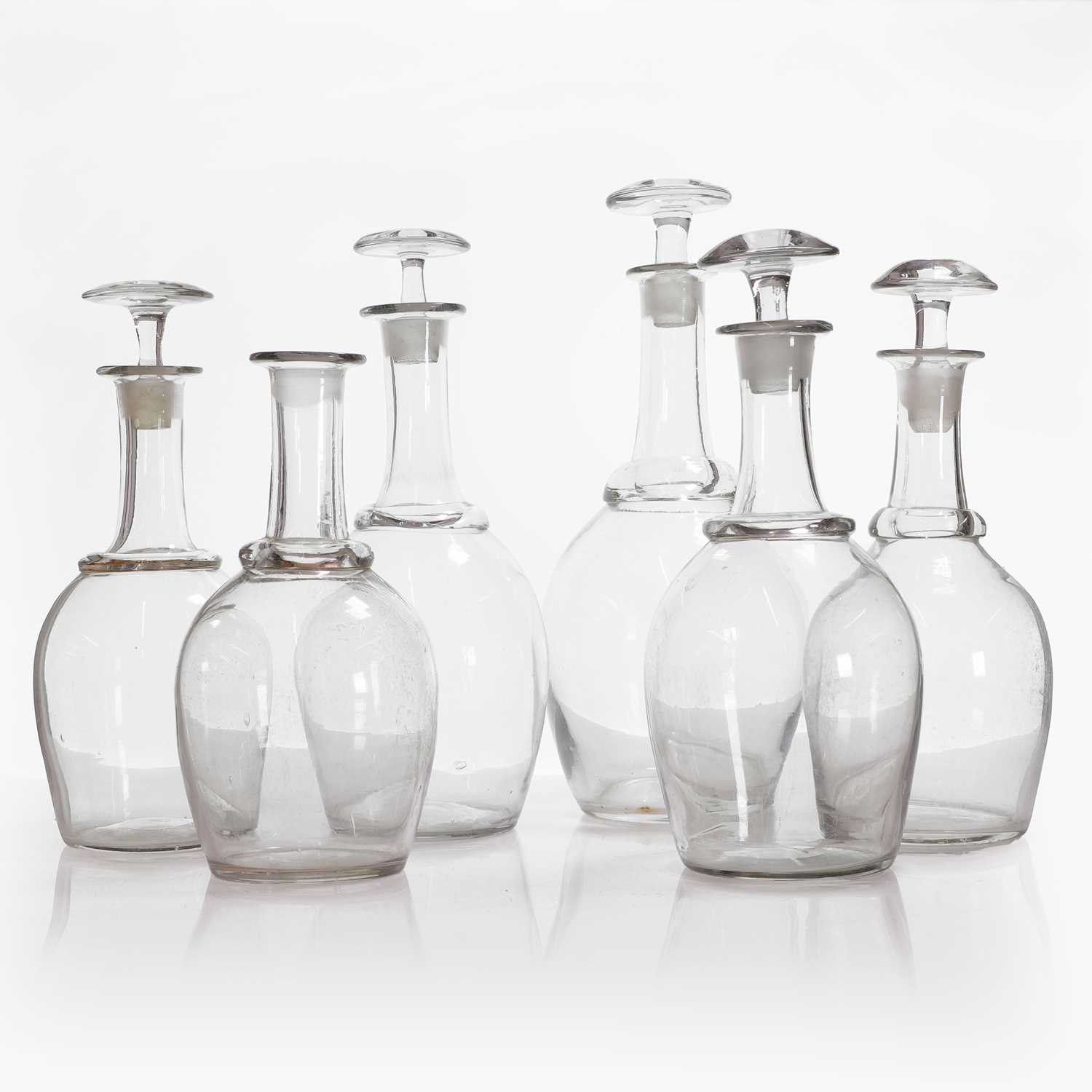 Lot 106 - A group of six glass decanters
