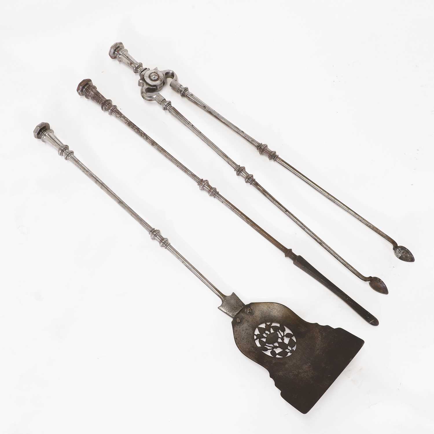 Lot 127 - A set of three George III fire irons