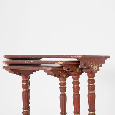 Lot 80 - A nest of three red-lacquered tables