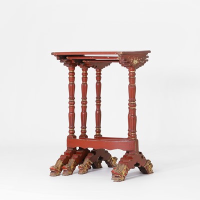 Lot 80 - A nest of three red-lacquered tables