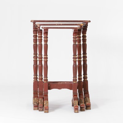 Lot 80 - A nest of three red-lacquered tables