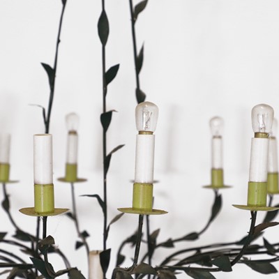 Lot 389 - A green-painted sixteen-light chandelier