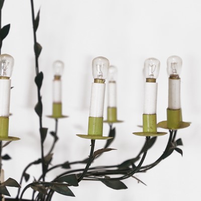 Lot 389 - A green-painted sixteen-light chandelier