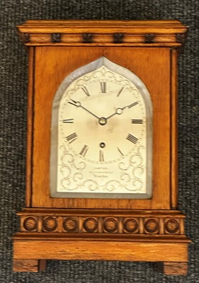 Lot 68 - An oak library timepiece