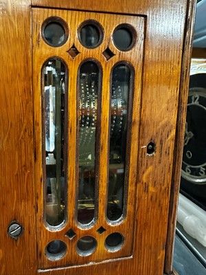 Lot 68 - An oak library timepiece