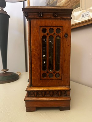 Lot 68 - An oak library timepiece