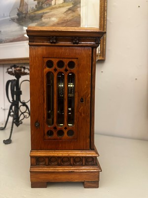 Lot 68 - An oak library timepiece