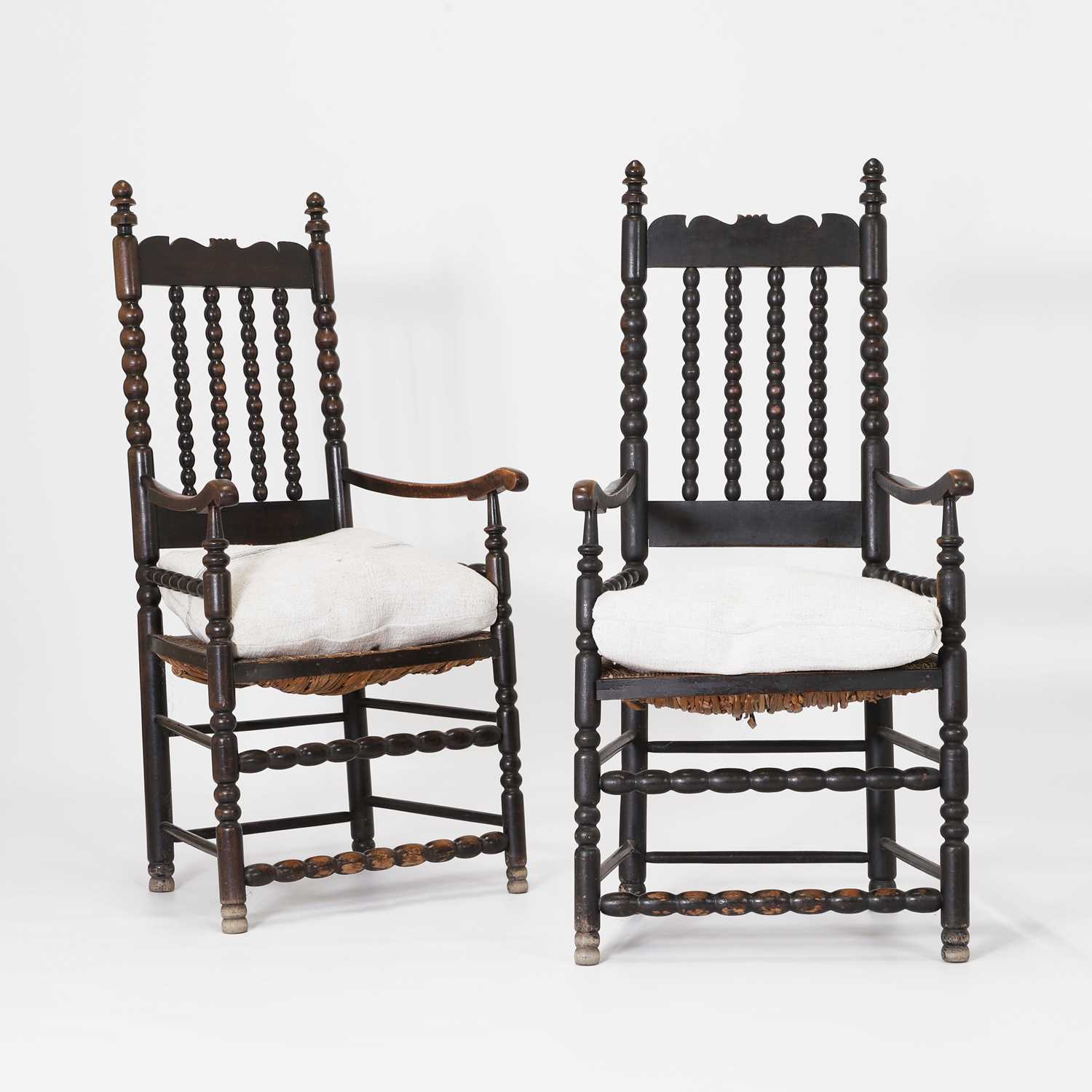 Lot 161 - A pair of beechwood elbow chairs