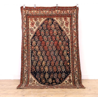 Lot 418 - A wool rug