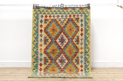 Lot 423 - A kilim rug