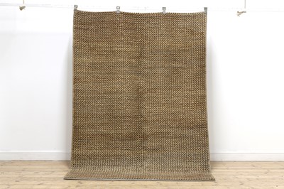 Lot 424 - A jute rug