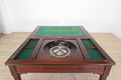 Lot 247 - A mahogany and satinwood games table in the Sheraton taste