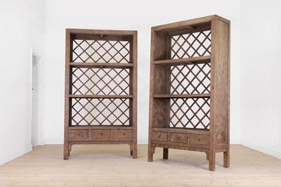 Lot 257 - A pair of Chinese-style hardwood open bookcases