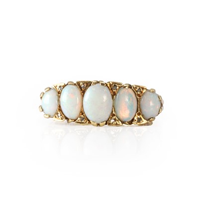 Lot 167 - A 9ct gold opal and diamond ring