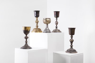 Lot 229 - A group of metal Communion chalices