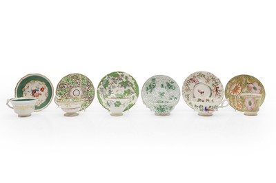 Lot 227 - A collection of twelve porcelain teacups and saucers