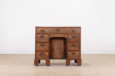 Lot 585 - A George III mahogany caddy-top kneehole desk